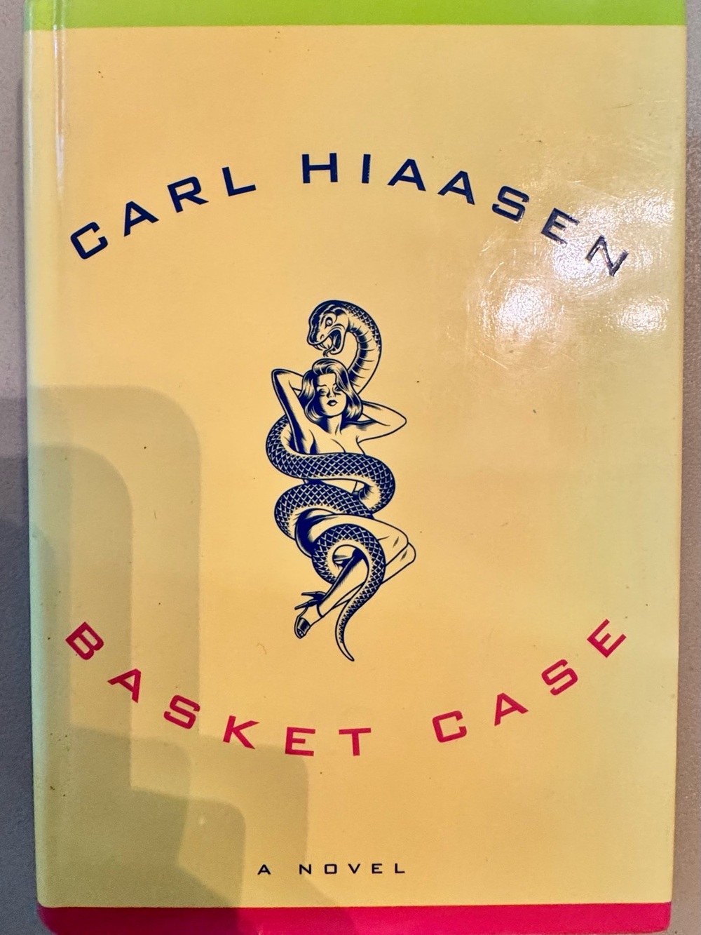 Basket Case by Carl Hiaasen — Yellow Cover Novel